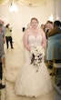 Bride wearing Danielle by Maggie Sottero walking down the aisle