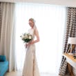 Bride wearing Davis Leigh wedding dress by Sottero and Midgley