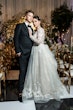 Bride wearing Zander by Sottero and Midgley with her husband