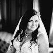Portrait in black and white of bride wearing wedding dress called Valona.