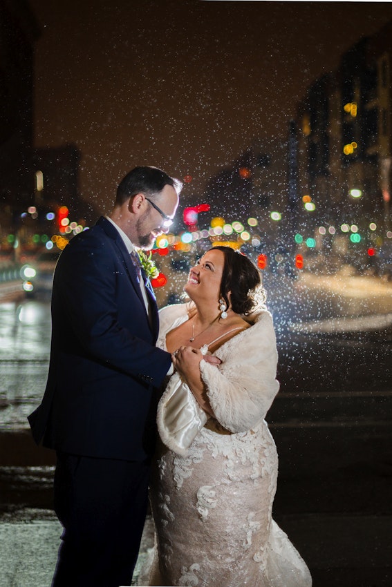 Bride and Groom Dancing in the Rain Wearing Wedding Gown Tuscany Marie by Maggie Sottero