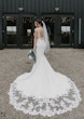 Real Bride Posing In White Wedding Dress Named Sadie By Rebecca Ingram