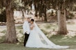 Bride wearing Stevie by Maggie Sottero with her husband