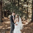 Groom with Bride in Sweetheart Neckline Wedding Dress with Floral Lace Motifs Called Hattie Lane Lynette Marie by Rebecca Ingram