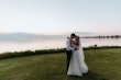 Groom With Bride Wearing A-Line Lace Wedding Dress Marisol By Rebecca Ingram