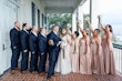 Wedding Party with Bride Wearing A-Line Wedding Dress Called Wallis by Maggie Sottero