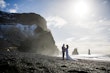 Bride wearing Tuscany Lynette by Maggie Sottero with her husband on the beach