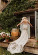 Back of a bride wearing Greenley wedding dress by Maggie Sottero