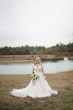 Bride In Off The Shoulder Lace Wedding Dress Called Tiffany By Maggie Sottero 