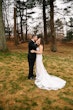 Bride In Lace Beaded Mermaid Wedding Dress Called January By Maggie Sottero With Groom