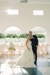 Bride wearing Selena by Maggie Sottero with her husband at their venue